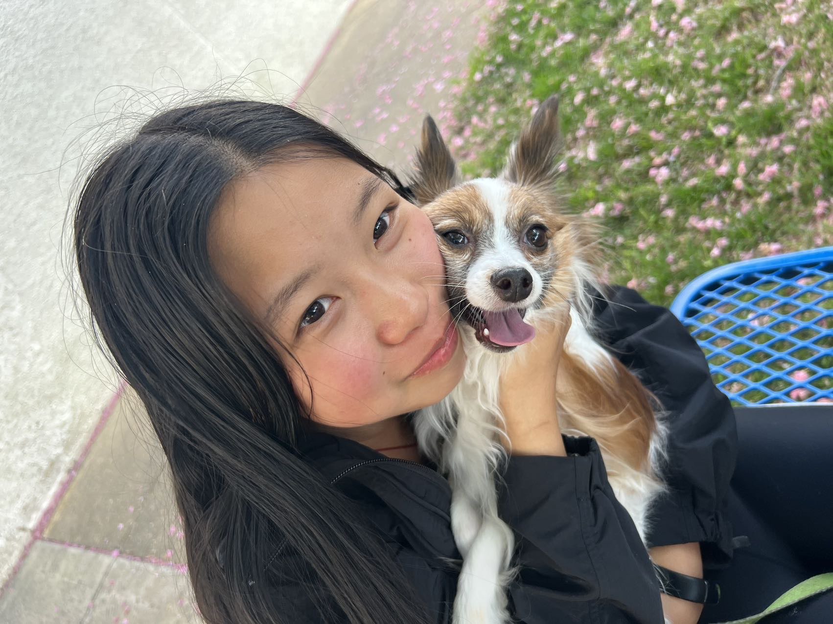 Alice cheek to cheek with her dog